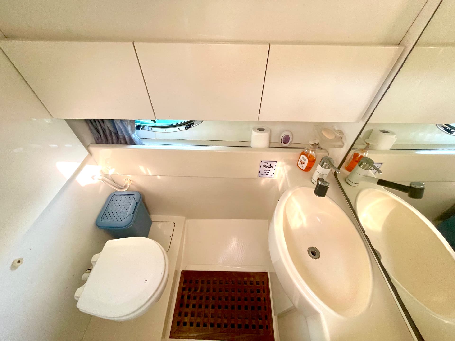 The bathroom with electric WC and sink